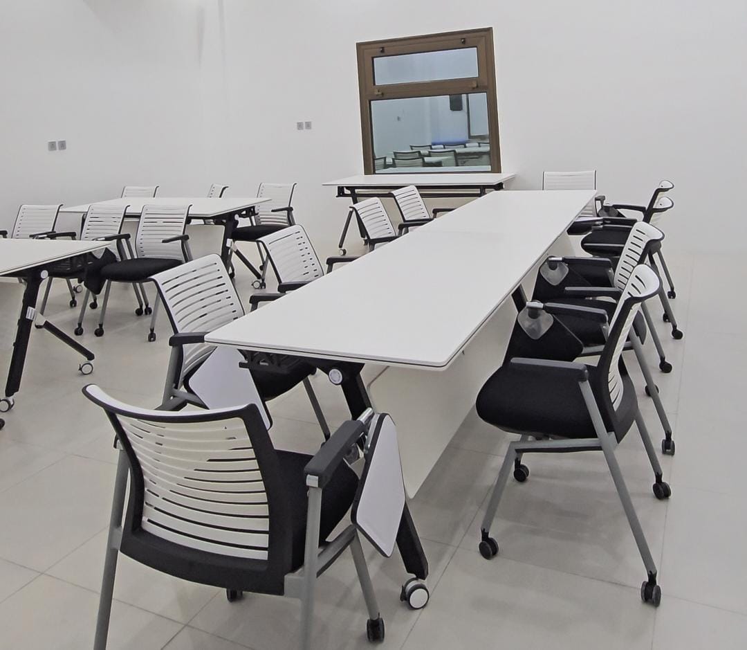 Training hall interior with digital boards